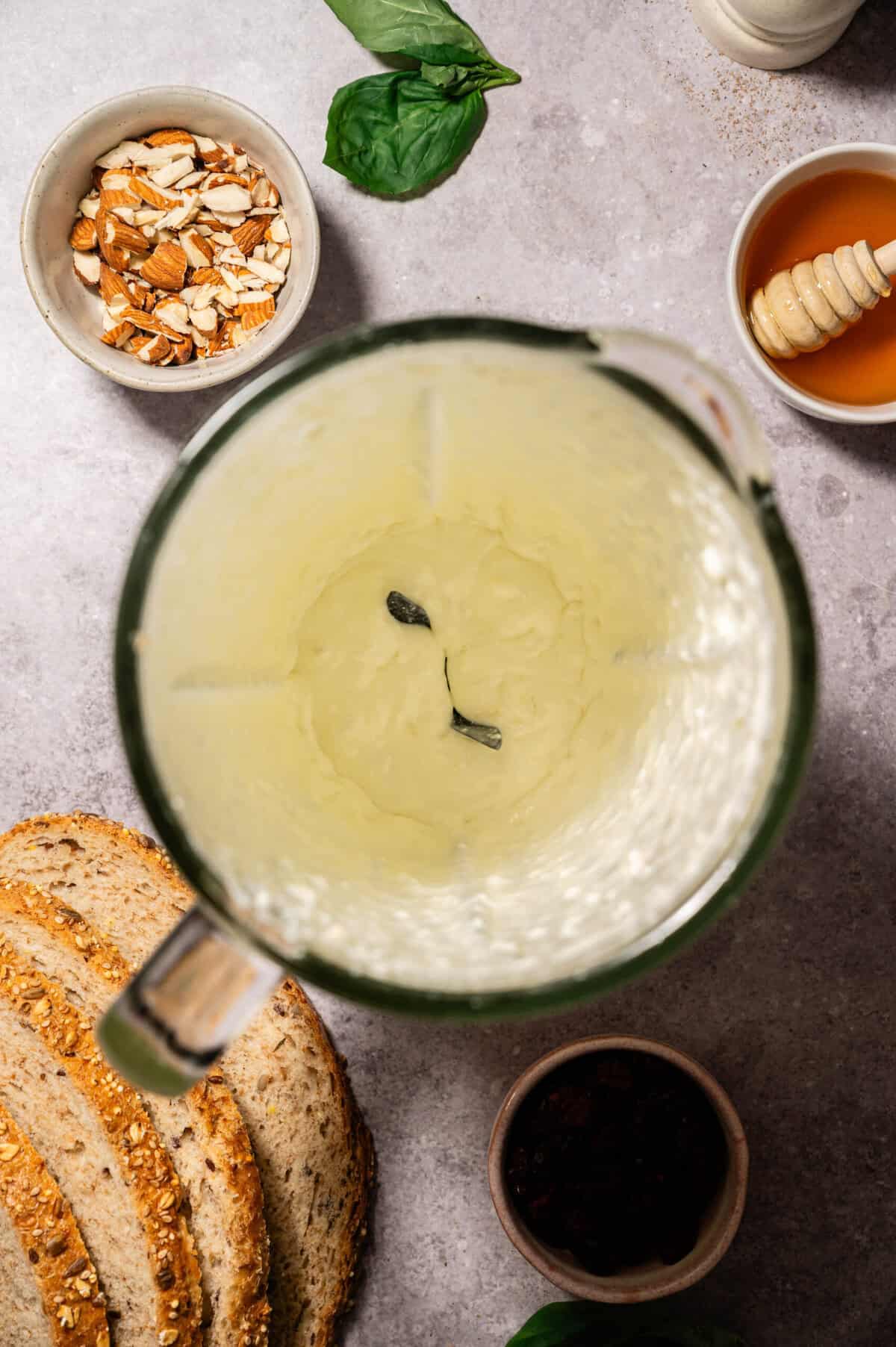 Blender filled with smooth, creamy whipped feta after blending.