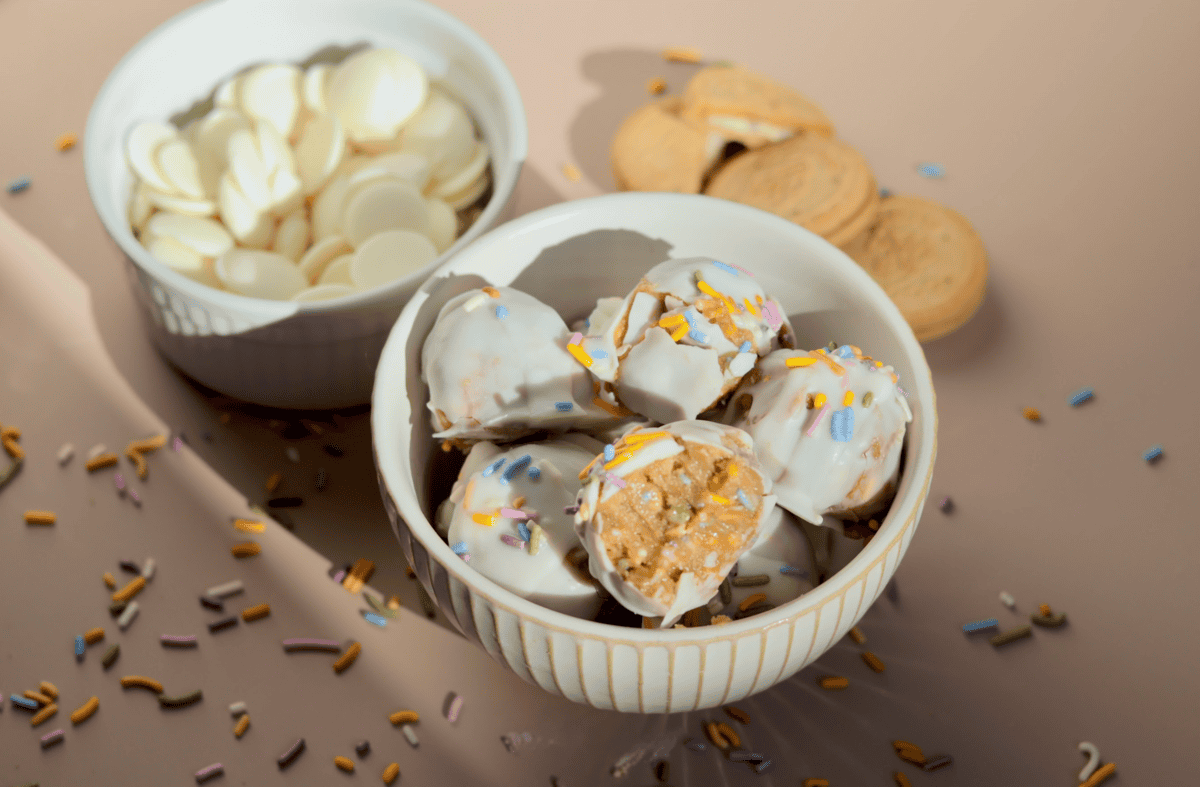 These no-bake birthday cake cookie truffles are made with Goodie Girl sandwich cookies, coconut cream, and white chocolate. Gluten-free, dairy-free, and ready in 30 minutes.
